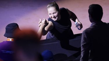 epa12044399 Jelena Ostapenko (C) of Latvia celebrates after winning her final match against Aryna Sabalenka of Belarus at the WTA Tennis Grand Prix tournament in Stuttgart, Germany, 21 April 2025.  EPA/RONALD WITTEK
