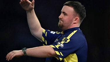 England's Luke Littler reacts as he plays against England's Stephen Bunting during their PDC World Darts Championship semi-final at Alexandra Palace in London on January 2, 2025. 
Ben STANSALL / AFP