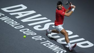 2023-11-23 22:09:01 Serbia's Novak Djokovic returns the ball against Britain's Cameron Norrie during the second men's doubles quarter-final tennis match between Serbia and Great Britain of the Davis Cup tennis tournament at the Martin Carpena sportshall, in Malaga on November 23, 2023. 
JORGE GUERRERO / AFP