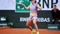 epa12136664 Iga Swiatek of Poland hits a forehand during her Women's 1st round match against Rebecca Sramkova of Slovakia at the French Open Grand Slam tennis tournament at Roland Garros in Paris, France, 26 May 2025.  EPA/CHRISTOPHE PETIT TESSON