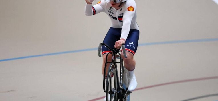 Great Britain's  #121 Matthew Richardson celebrates winning silver in the men's sprint final at the 2025 UCI Track World Championships, in the Penalolen Velodrome in Santiago, on October 26, 2025. 
Javier TORRES / AFP