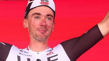 UAE Team Emirates's US rider Brandon McNulty celebrates on the podium after winning the fifteenth stage of the Giro d'Italia 2023 cycling race, 195 km between Seregno and Bergamo, on May 21, 2023. 
Luca Bettini / AFP