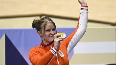 Gold medalist Netherland's Caroline Groot celebrates on the podium of the women's C4-5 500M cycling time trial track event during the Paris 2024 Paralympic Games at The Saint-Quentin-en-Yvelines National Velodrome in Montigny-le-Bretonneux, south-west of Paris on August 29, 2024. 
JULIEN DE ROSA / AFP