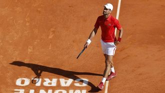epa11274897 Novak Djokovic of Serbia reacts during his quarter final match against Alex De Minaur of Australia at the ATP Monte Carlo Masters tennis tournament in Roquebrune Cap Martin, France, 12 April 2024.  EPA/SEBASTIEN NOGIER