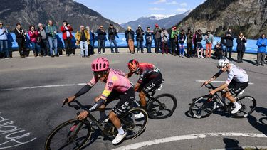 epa11300544 (L-R) Richard Carapaz from Ecuador of team EF Education-Easypost, Egan Bernal from Colombia of team Ineos Grenadiers and Juan Ayuso from Spain of UAE Team Emirates in action during the second stage, a 171,02 km race between Fribourg and Salvan-Les Marecottes at the 77th Tour de Romandie UCI World Tour Cycling race, in Salvan, Switzerland, 25 April 2024.  EPA/JEAN-CHRISTOPHE BOTT