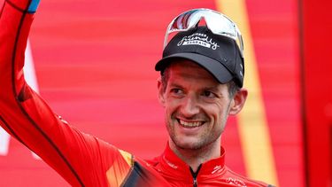 2023-09-16 17:53:27 Team Bahrain's Dutch rider Wout Poels celebrate on the podium after winning the stage 20 of the 2023 La Vuelta cycling tour of Spain, a 207,8 km race between Manzanares el Real and Guadarrama, on September 16, 2023. 
Oscar DEL POZO / AFP
