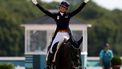 epa11524695 Dinja van Liere of Netherlands riding Hermes reacts after competing in the Dressage Individual Grand Prix Freestyle of the Equestrian Dressage competitions in the Paris 2024 Olympic Games, at the Chateau de Versailles in Versailles, France, 04 August 2024.  EPA/CAROLINE BREHMAN