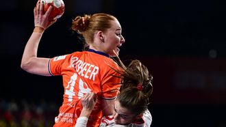 epa11770783 Dione Housheer of the Netherlands (L) in action against Emma Cecilie Uhrskov Friis of Denmark (R) during the EHF Women's EURO 2024 main round handball match between Denmark and Netherlands, in Vienna, Austria, 11 December 2024.  EPA/CHRISTIAN BRUNA