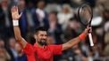 Serbia's Novak Djokovic celebrates after winning his men's singles match against US Mackenzie Mcdonald on day 3 of the French Open tennis tournament on Court Philippe-Chatrier at the Roland-Garros Complex in Paris on May 27, 2025. 
Franck FIFE / AFP