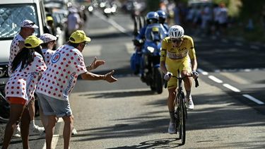 UAE Team Emirates - XRG's Slovenian rider Tadej Pogacar wearing the overall leader's yellow jersey cycles in the final kilometers of the 10th stage of the 113th edition of the Tour de France cycling race, 166,6 km between Aurillac and Le Lioran in the Massif Central, on July 14, 2026. 
Loic VENANCE / AFP