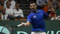 2023-09-15 19:27:48 Serbia's Novak Djokovic returns a ball to Spain's Alejandro Davidovich Fokina during the group stage men's singles match between Spain and Serbia of the Davis Cup tennis tournament at the Fuente San Luis Sports Hall in Valencia on September 15, 2023. 
JOSE JORDAN / AFP