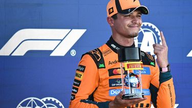 McLaren's British driver Lando Norris holds his Pirelli Sprint Pole award after winning the pole position during Sprint qualifying ahead of the 2026 Miami Formula One Grand Prix at Miami International Autodrome in Miami Gardens, Florida, on May 1, 2026.  
CHANDAN KHANNA / AFP