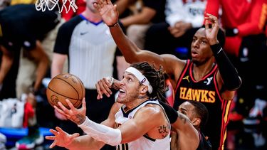 epa11023864 Denver Nuggets forward Aaron Gordon (L) in action against Atlanta Hawks guard Dejounte Murray (C) and Hawks forward Onyeka Okongwu (R) during the second half of the NBA basketball game between the Denver Nuggets and the Atlanta Hawks at State Farm Arena in Atlanta, Georgia, USA, 11 December 2023.  EPA/ERIK S. LESSER SHUTTERSTOCK OUT