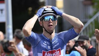 Team Alpecin's Kaden Groves celebrates crossing first the finish line of the stage 14 of the Vuelta a Espana, a 200,5 km race between Villafranca del Bierzo and Villablino, on August 31, 2024.   
MIGUEL RIOPA / AFP