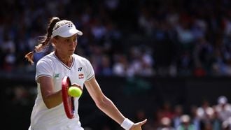 Kazakhstan's Elena Rybakina returns the ball to Ukraine's Elina Svitolina during their women's singles quarter-finals tennis match on the tenth day of the 2024 Wimbledon Championships at The All England Lawn Tennis and Croquet Club in Wimbledon, southwest London, on July 10, 2024. 
HENRY NICHOLLS / AFP