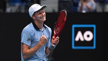 epa10414747 Jenson Brooksby of the USA celebrates match point against Casper Ruud of Norway  during their second round match in the 2023 Australian Open tennis tournament at Melbourne Park in Melbourne, Australia, 19 January 2023.  EPA/LUKAS COCH AUSTRALIA AND NEW ZEALAND OUT