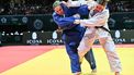 Netherlands' Marit Kamps competes against International Judo's Federation's Mariia Ivanova (blue) in the women's +78kg during the 2025 Judo World Championships at 'Papp Laszlo' Arena of Budapest, Hungary, on June 19, 2025. 
Attila KISBENEDEK / AFP