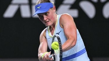 Netherlands' Suzan Lamens hits a return against Austria's Anastasia Potapova during their women's singles match on day one of the Australian Open tennis tournament in Melbourne on January 18, 2026. 
WILLIAM WEST / AFP
