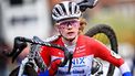 Dutch rider Puck Pieterse carries her bike as she competes in the women's elite race at the 'Urban Cross Kortrijk' cyclocross cycling event, the second stage in the X2O Badkamers 'Trofee Veldrijden' competition, in Kortrijk on November 25, 2023. 
JASPER JACOBS / Belga / AFP