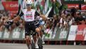 Team UAE's Spanish rider Juan Ayuso crosses the finish line to win the 12th stage of the Vuelta a Espana, a 144.9 km race between Laredo and Corrales de Buelna, on September 4, 2025. 
ANDER GILLENEA / AFP
