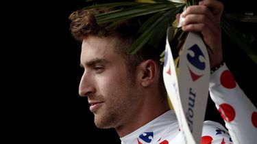 epa06062014 Cannondale Drapac Professional Cycling Team rider Taylor Phinney of US celebrates on the podium wearing the best climber's polka-dot jersey following the 2nd stage of the 104th edition of the Tour de France cycling race over 203.5 km between Duesseldorf and Liege, Belgium, 02 July 2017.  EPA/YOAN VALAT