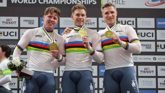Netherlands' #169 Roy Van der Berg, #168 Harrie Lavreysen and #166 Jeffrey Hoogland pose with their medals after winning the men's team sprint final during the 2025 UCI Track World Championships at the Peñalolen Velodrome, in Santiago, on October 22, 2025. 
Javier TORRES / AFP