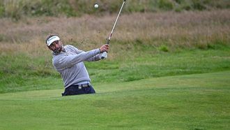 2023-07-22 18:15:22 Netherland's Joost Luiten plays out of a bunker on the 18th green on day three of the 151st British Open Golf Championship at Royal Liverpool Golf Course in Hoylake, north west England on July 22, 2023.                                                                                                                The 151st Open at The Royal Liverpool Golf Course is set to run until July 23.
Paul ELLIS / AFP