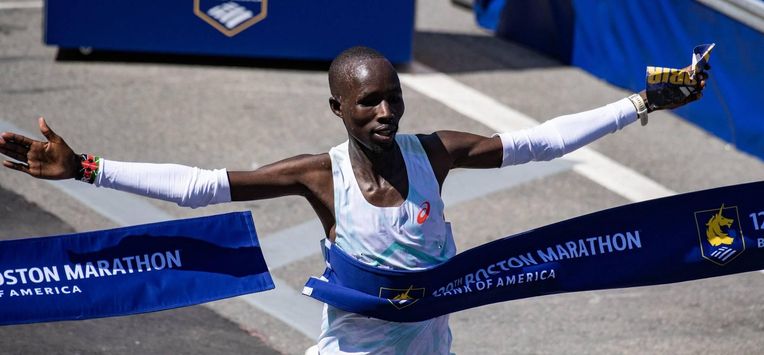 Kenyan distance runner John Korir crosses the finish line as he wins the men's race during the 129th Boston Marathon on April 21, 2025, in Boston, Massachusetts.  The marathon includes around 30,000 athletes from 129 countries running the 26.2 miles from Hopkinton to Boston, Massachusetts.  The event is the world's oldest annually run marathon. 
Joseph Prezioso / AFP