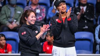 Japan’s Naomi Osaka (R) celebrates Japan’s Nao Hibino's victory against Kazakhstan’s Yulia Putintseva during their women's singles match of the Billie Jean Cup tennis qualifying tie between Japan and Kazakhstan in Tokyo on April 13, 2024. 
Yuichi YAMAZAKI / AFP