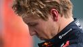 Red Bull Racing's New Zealand driver Liam Lawson walks back to his team garage after getting out of his car at the end of the Formula One Chinese Grand Prix in Shanghai on March 23, 2025. 
GREG BAKER / AFP