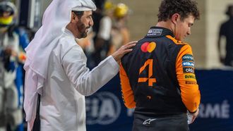 FIA president Mohammed Ben Sulayem (L) greets McLaren's British driver Lando Norris at the end of the qualifying session ahead of the Formula One Qatar Grand Prix at the Lusail International Circuit in Lusail on November 29, 2025. 
Andrej ISAKOVIC / AFP