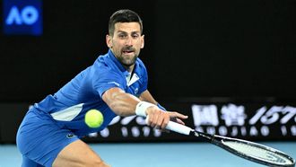 epa11084983 Novak Djokovic of Serbia in action during his round 2 match against Alexei Popyrin of Australia on Day 4 of the 2024 Australian Open at Melbourne Park in Melbourne, Australia, 17 January 2024.  EPA/JAMES ROSS  AUSTRALIA AND NEW ZEALAND OUT