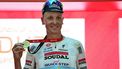 Team Soudal Quick-Step Belgian rider Tim Merlier celebrates on the podium after winning the fifth stage of the UAE Tour cycling race between the American University and the Hamdan bin Mohammed Smart University in Dubai on February 21, 2025. 
Giuseppe CACACE / AFP