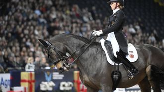 2022-11-27 11:23:39 epa10332180 Jessica von Bredow-Werndl of Germany rides Tsf Dalera BB to win the FEI Grand Prix kuer dressage competition at the Sweden International Horse Show held at the Friends Arena, Stockholm, Sweden, 27 November 2022.  EPA/FREDRIK SANDBERGG SWEDEN OUT