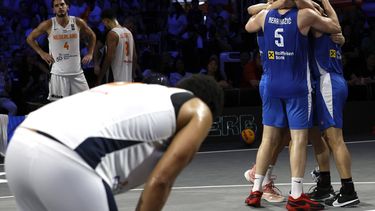 epa11968048 Serbia's players celebrate their winning as Netherlands's Dimeo van der Horst (Front), Jan Driessen (C) and Bryan Alberts (R) show their dejection during the men's FIBA basketball 3x3 Champions Cup 2025 basketball final game between Serbia and Netherlands in Bangkok, Thailand, 16 March 2025.  EPA/RUNGROJ YONGRIT