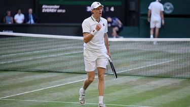 Italy's Jannik Sinner celebrates winning a point against Germany's Alexander Zverev during their men's singles final tennis match on the fourteenth day of the 2026 Wimbledon Championships at The All England Lawn Tennis and Croquet Club in Wimbledon, southwest London, on July 12, 2026. 
Henry NICHOLLS / AFP