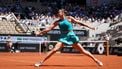 Belarus' Aryna Sabalenka plays a backhand return to Serbia's Olga Danilovic during their women's singles match on day 6 of the French Open tennis tournament on Court Philippe-Chatrier at the Roland-Garros Complex in Paris on May 30, 2025. 
Dimitar DILKOFF / AFP
