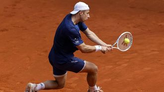 Netherlands' Tallon Griekspoor returns the ball to Denmark's Holger Rune during the third round of the 2024 ATP Tour Madrid Open tournament tennis match at Caja Magica in Madrid on April 28, 2024. 
OSCAR DEL POZO / AFP