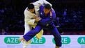 Azerbaijan's Dzhamal Gamzatkhanov (white) competes against Netherlands' Jur Spijkers in the men's over 100 kg quarter-final at the World Judo Championships in Baku on October 10, 2026. 
Anne-Christine POUJOULAT / AFP