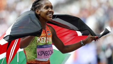 epa11543718 Faith Kipyegon of Kenya celebrates winning the Women 1500m Final of the Athletics competitions in the Paris 2024 Olympic Games, at the Stade de France stadium in Saint Denis, France, 10 August 2024.  EPA/FRANCK ROBICHON