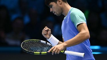 Spain's Carlos Alcaraz reacts during his match against Norway's Casper Ruud at the ATP Finals tennis tournament in Turin on November 11, 2024. 
Marco BERTORELLO / AFP