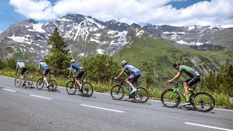 Cyclists (L-R) Italy's Samuele Zoccarato, Austria's Michael Gogl, Norway's Andre Drege, the Netherland's Oscar Riesebeek and Germany's Jonas Rapp ride in a partly snow-covered mountain area during the 4th stage from St. Johann Alpendorf to Kals am Großglockner (151,7 km) of the 2024 Tour of Austria on July 6, 2024.  
Johann GRODER / APA / AFP