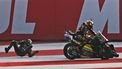2023-09-23 13:37:51 Mooney VR46 Racing's Italian rider Luca Marini (L) crashes as Mooney VR46 Racing Team's Italian rider Marco Bezzecchi rides past during the sprint race of the Indian MotoGP Grand Prix at the Buddh International Circuit in Greater Noida on the outskirts of New Delhi, on September 23, 2023. 
Money SHARMA / AFP
