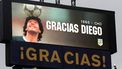 epa08852132 The stadium's screen displays a image of Diego Maradona and the legend '1960-infinity Thanks Diego' as part of a tribute to the late football legend during a match between Boca Juniors and Newell's Old Boys for the 2020 Argentine Primera Division, at La Bombonera stadium, in Buenos Aires, 29 November 2020. The Argentine football championship has been renamed to honour the late Diego Maradona.  EPA/ALEJANDRO PAGNI / POOL