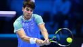 epa11718649 Carlos Alcaraz of Spain hits a backhand during his Round Robin match against Andrey Rublev of Russia at the Nitto ATP Finals in Turin, Italy, 13 November 2024.  EPA/ALESSANDRO DI MARCO