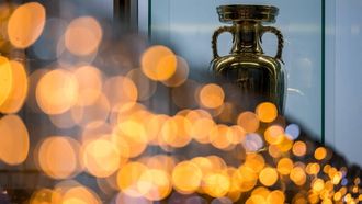 This photograph taken on December 18, 2023, shows The UEFA Men's European Football Championship trophy displayed at the House of European Football in Nyon. 
Fabrice COFFRINI / AFP