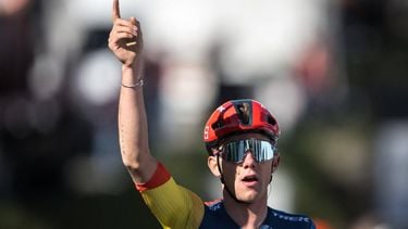 Team Lidl-Trek's Belgian rider Thibau Nys celebrates as he crosses the finish line to win the second stage of the Tour of Romandy UCI cycling World tour 171 km from Fribourg to Salvan / Les Marecottes on April 25, 2024. 
Fabrice COFFRINI / AFP