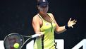 Shelby Rogers of the US hits a return Netherlands' Arianne Hartono during their women's singles match on day two of the Australian Open tennis tournament in Melbourne on January 17, 2023. 
MANAN VATSYAYANA / AFP