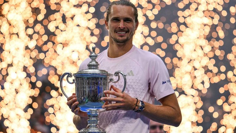 Germany's Alexander Zverev holds the trophy after defeating USA's Ben Shelton in the men's singles final tennis match on day fifteen of the US Open tennis tournament at the USTA Billie Jean King National Tennis Center in New York on September 13, 2026. 
ANGELA WEISS / AFP