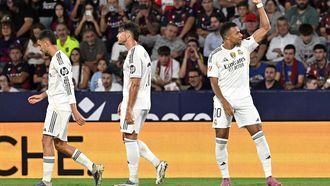 Real Madrid's French forward #10 Kylian Mbappe celebrates after scoring during the Spanish league football match between Levante UD and Real Madrid CF at the Ciutat de Valencia stadium in Valencia on September 23, 2025. 
Jose JORDAN / AFP
